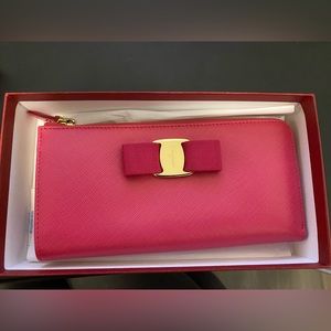 Authentic brand new ferragamo wallet in pink